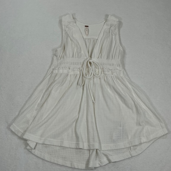 Free People Tops - Free People White Textured Sleeveless Babydoll Tie Front Top XS